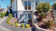 Exklusives Wohnen mit Pool und Weitblick: Modernes 1-FH mit ELW in Straubenhardt-Langenalb - Außenbereich Einliegerwohnung