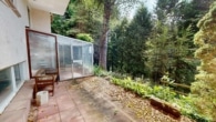 Naturnah Wohnen: Außergewöhnliches Architektenhaus mit vermieteter Einliegerwohnung in Marxzell - Terrasse