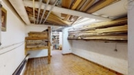 Naturnah Wohnen: Außergewöhnliches Architektenhaus mit vermieteter Einliegerwohnung in Marxzell - KG, Werkstatt und Lager